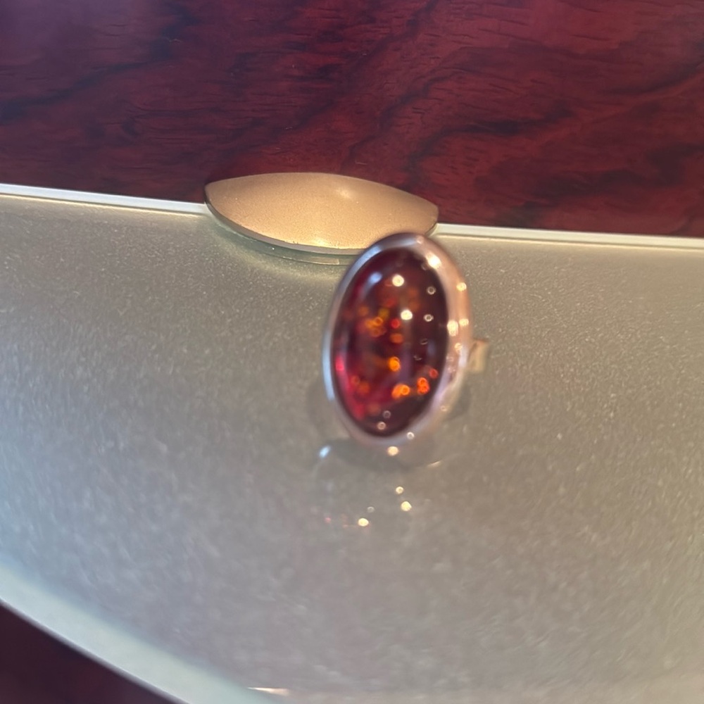 Silver ring with big amber